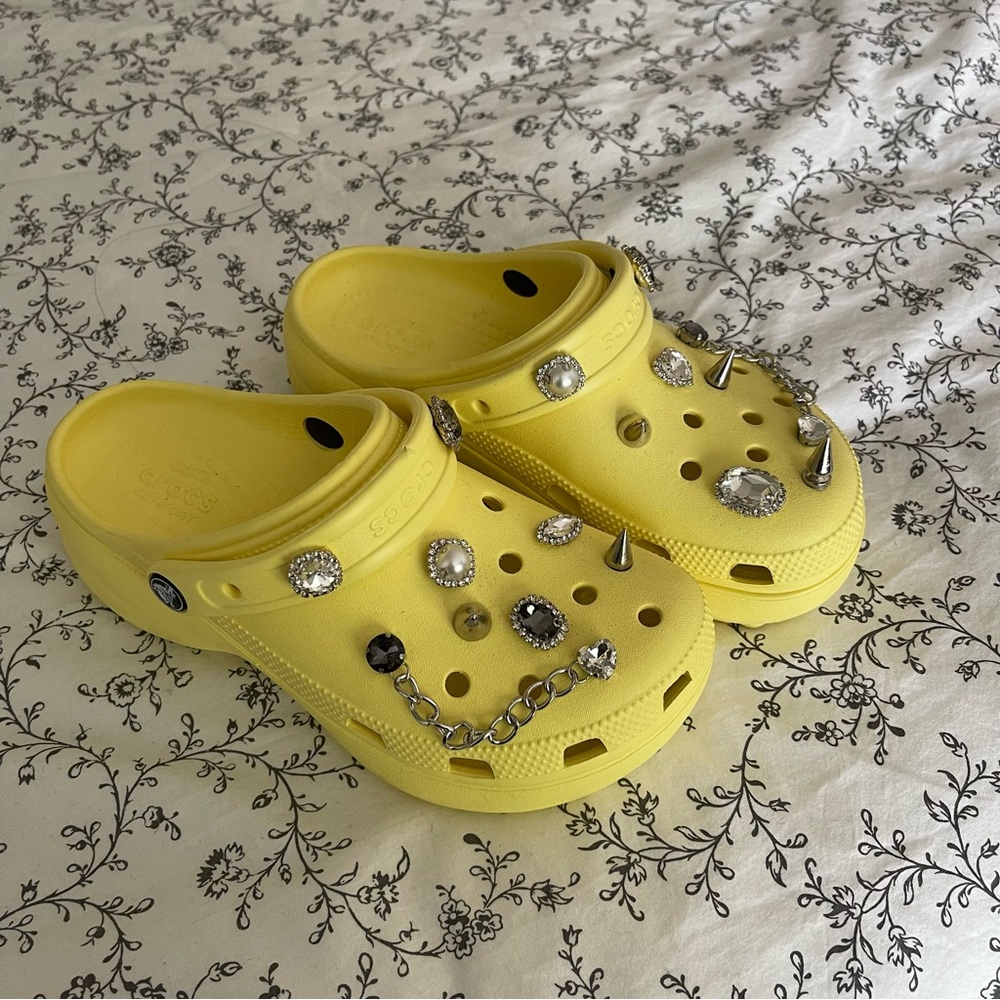 platform crocs with charms